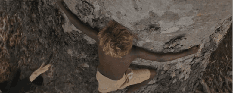 New Boy hugging a tree