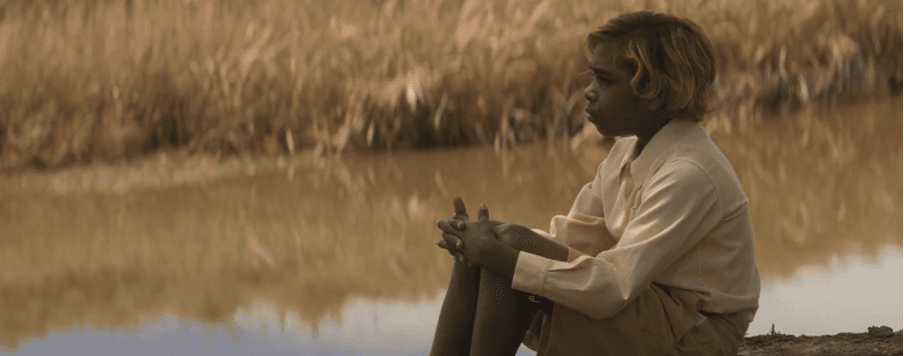 New Boy in button up shirt and sandals